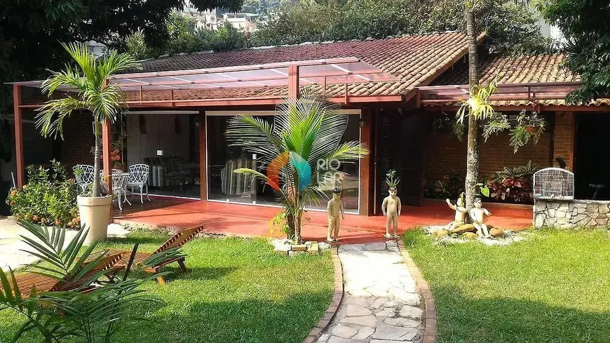 Foto 1 de Casa com 7 Quartos à venda, 400m² em Cosme Velho, Rio de Janeiro