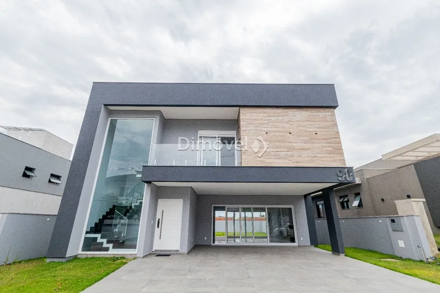 Foto 1 de Casa de Condomínio com 4 Quartos à venda, 294m² em Alphaville, Porto Alegre