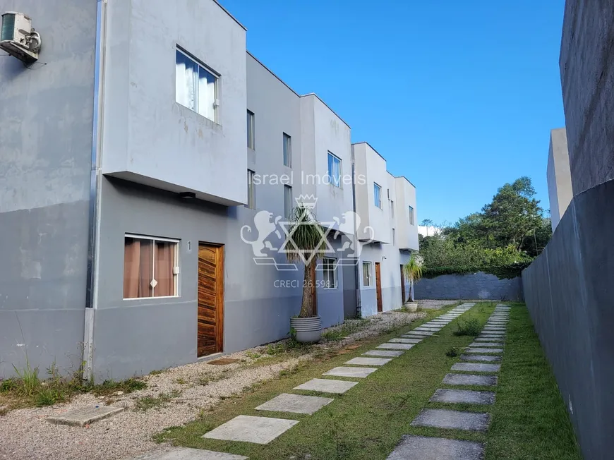 Foto 1 de Sobrado com 2 Quartos à venda, 72m² em Capricórnio III, Caraguatatuba