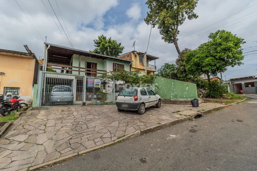 Foto 1 de Casa com 6 Quartos à venda, 247m² em Cavalhada, Porto Alegre