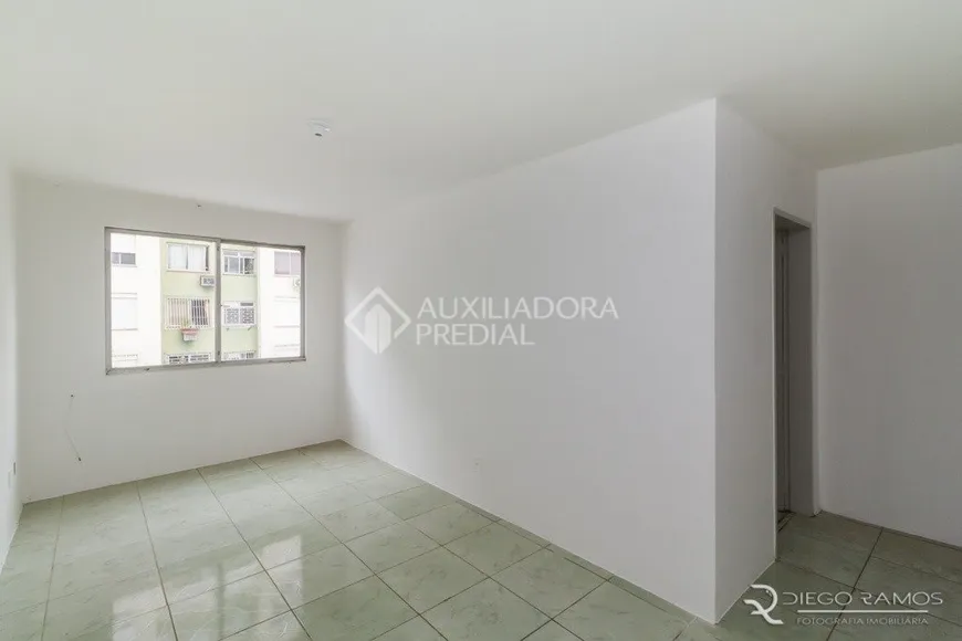 Foto 1 de Apartamento com 2 Quartos à venda, 57m² em Humaitá, Porto Alegre