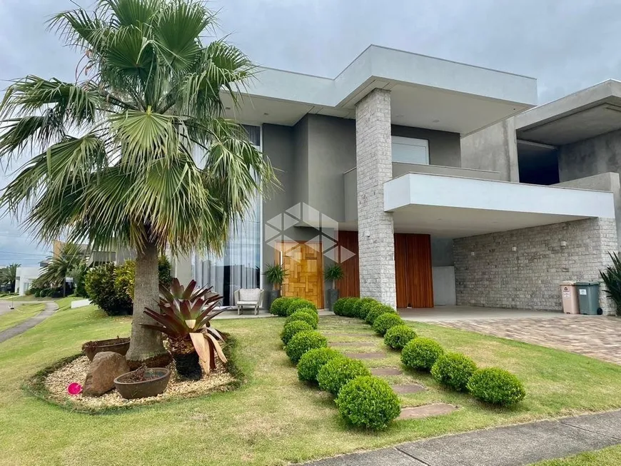 Foto 1 de Casa de Condomínio com 4 Quartos à venda, 300m² em Condominio Capao Ilhas Resort, Capão da Canoa