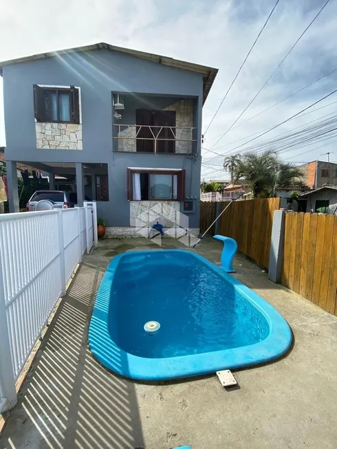 Foto 1 de Casa com 3 Quartos à venda, 171m² em Tarumã, Viamão