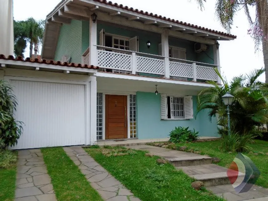 Foto 1 de Casa com 4 Quartos à venda, 229m² em Jardim Isabel, Porto Alegre