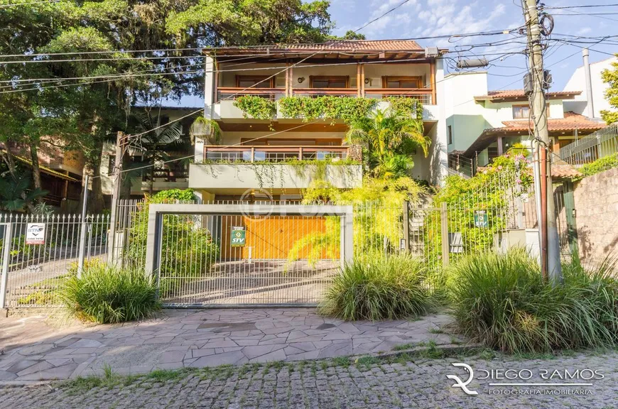 Foto 1 de Casa com 5 Quartos à venda, 427m² em Jardim Isabel, Porto Alegre