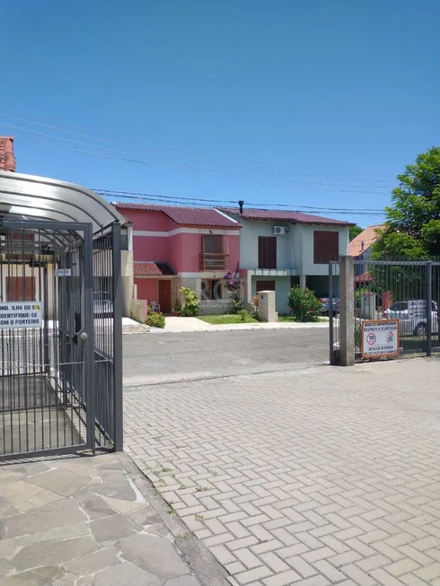 Foto 1 de Casa de Condomínio com 4 Quartos à venda, 156m² em Guarujá, Porto Alegre