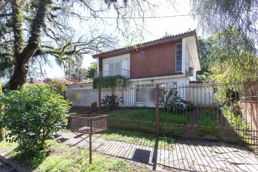 Foto 1 de Casa com 4 Quartos à venda, 278m² em Jardim Isabel, Porto Alegre