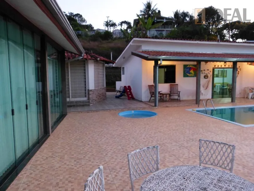 Foto 1 de Casa de Condomínio com 4 Quartos à venda, 170m² em Vila Santista, Serra Negra