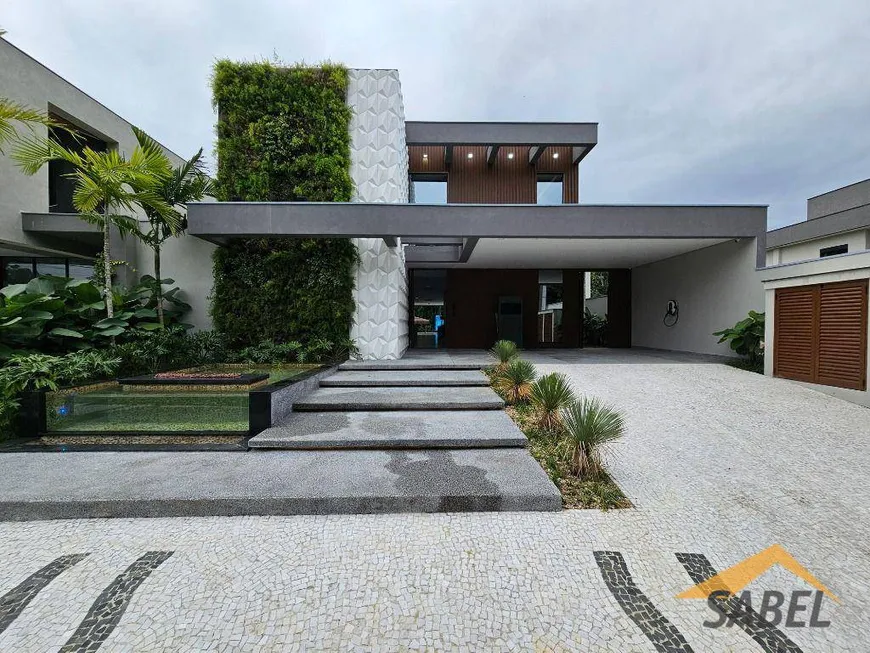 Foto 1 de Casa de Condomínio com 7 Quartos à venda, 611m² em Riviera de São Lourenço, Bertioga