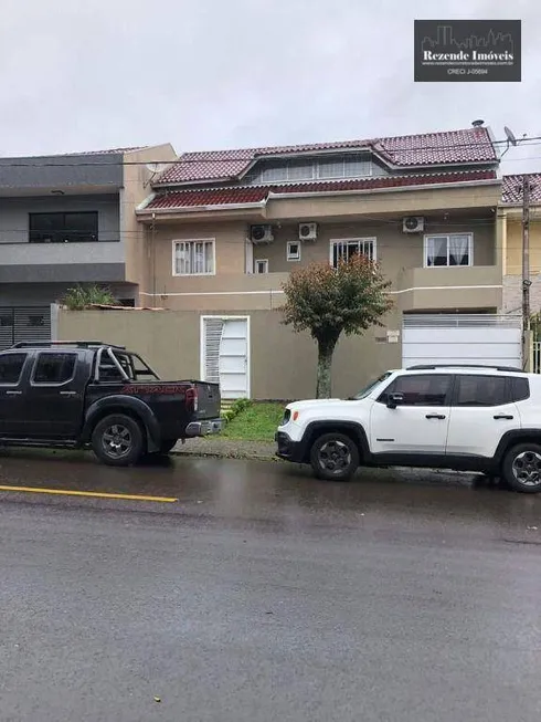 Foto 1 de Sobrado com 3 Quartos à venda, 221m² em Xaxim, Curitiba