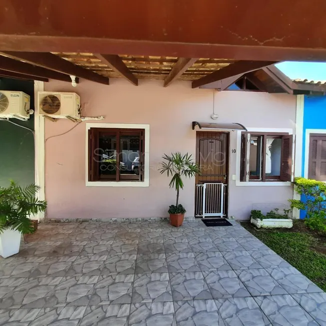 Foto 1 de Casa de Condomínio com 2 Quartos à venda, 65m² em Medianeira, Eldorado do Sul