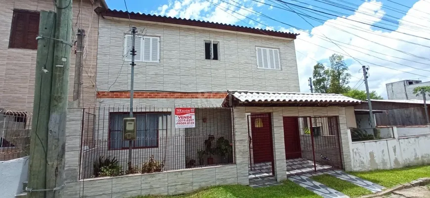 Foto 1 de Casa com 2 Quartos à venda, 61m² em Restinga, Porto Alegre