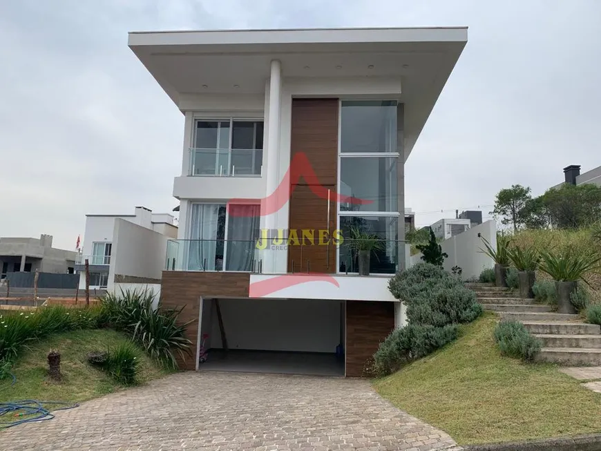 Foto 1 de Casa de Condomínio com 3 Quartos à venda, 225m² em Condominio Buena Vista, Viamão