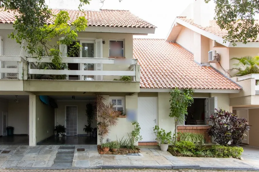 Foto 1 de Casa de Condomínio com 3 Quartos à venda, 171m² em Tristeza, Porto Alegre