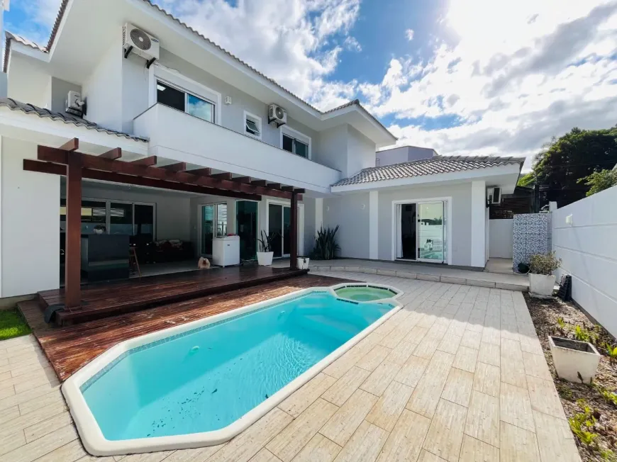 Foto 1 de Casa de Condomínio com 4 Quartos à venda, 226m² em Vargem Pequena, Florianópolis