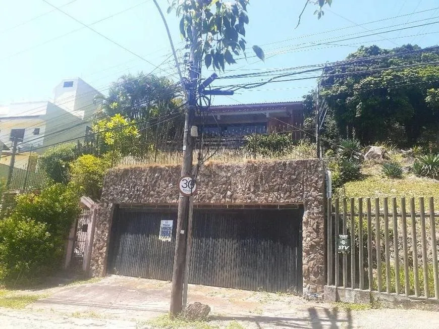 Foto 1 de Casa com 5 Quartos à venda, 319m² em Nonoai, Porto Alegre