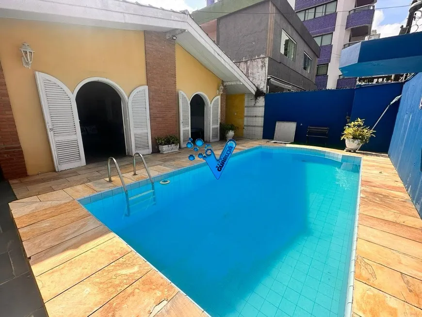 Foto 1 de Casa com 4 Quartos à venda, 165m² em Enseada, Guarujá