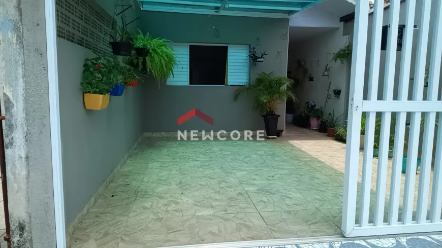 Foto 1 de Casa com 2 Quartos à venda, 70m² em Maracanã, Praia Grande