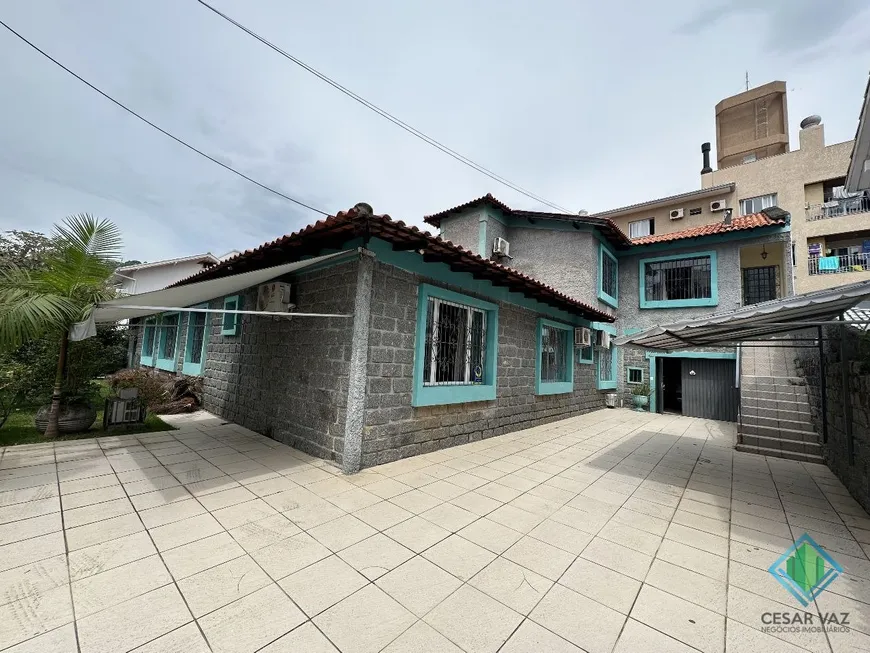 Foto 1 de Casa com 6 Quartos à venda, 343m² em Canasvieiras, Florianópolis