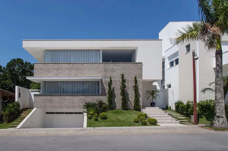 Foto 1 de Casa de Condomínio com 4 Quartos para venda ou aluguel, 500m² em Jurerê, Florianópolis