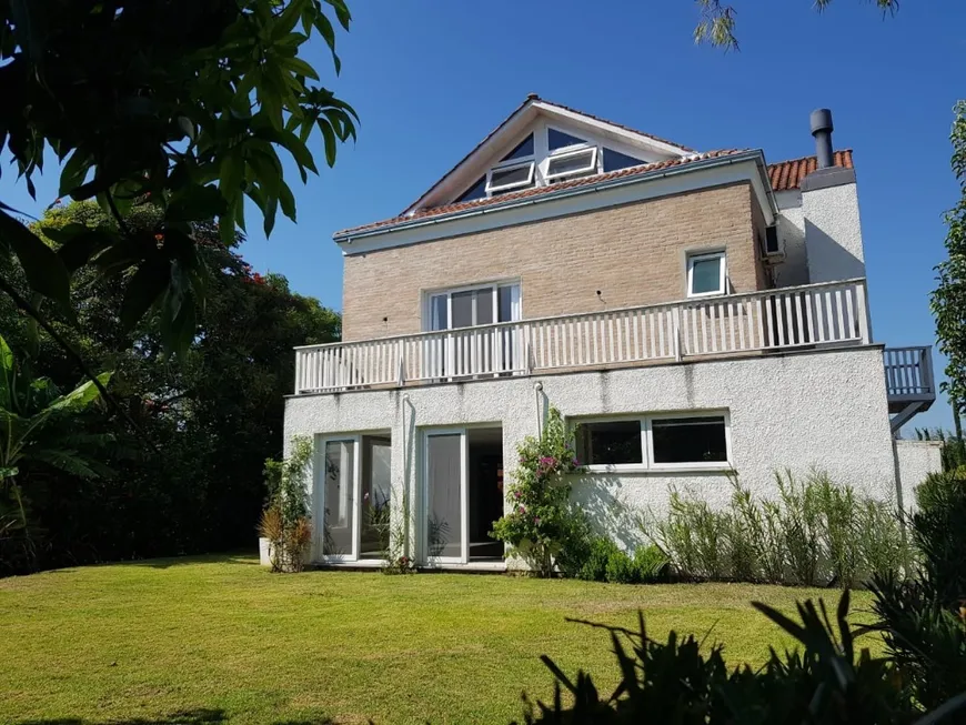 Foto 1 de Casa de Condomínio com 4 Quartos à venda, 303m² em Loteamento Eldourado, Eldorado do Sul