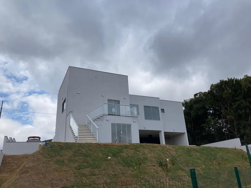 Foto 1 de Casa de Condomínio com 4 Quartos à venda, 200m² em Balneario Água Limpa, Nova Lima