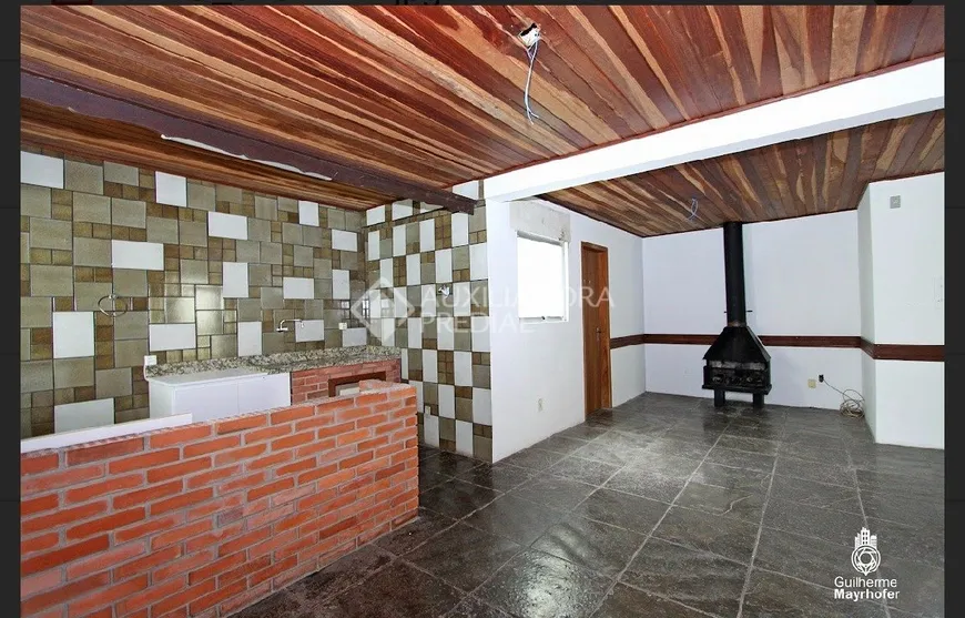 Foto 1 de Casa com 3 Quartos à venda, 400m² em Passo da Areia, Porto Alegre