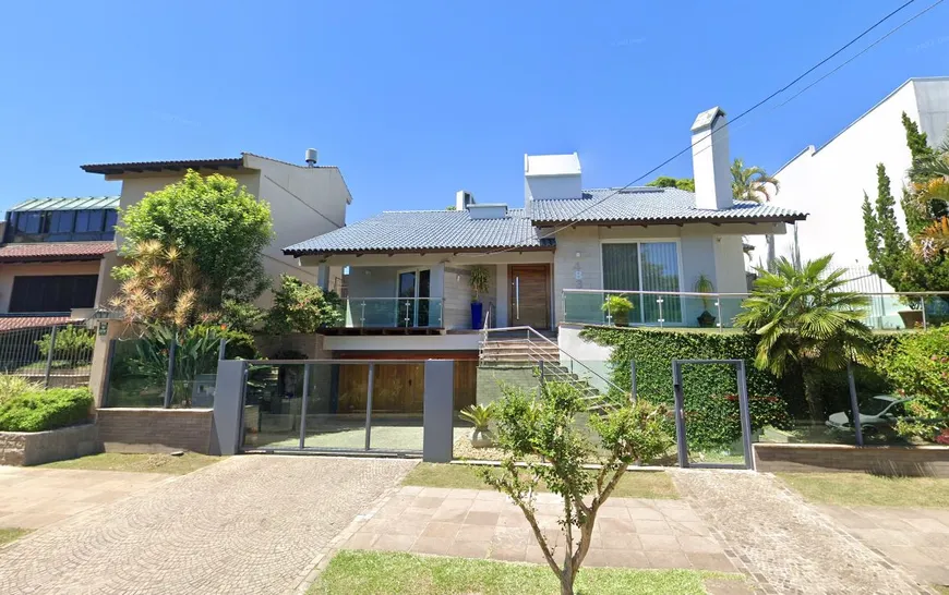 Foto 1 de Casa com 4 Quartos para alugar, 560m² em Chácara das Pedras, Porto Alegre