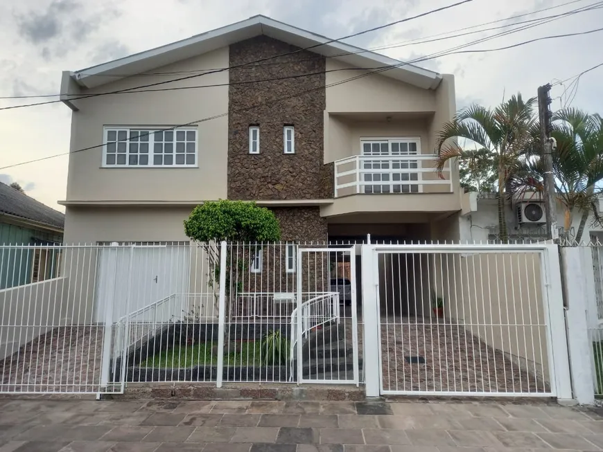 Foto 1 de Casa com 4 Quartos à venda, 266m² em Cristo Redentor, Porto Alegre