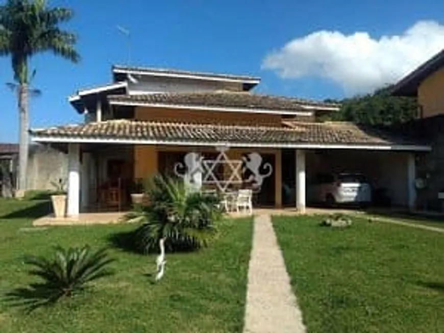 Foto 1 de Casa com 4 Quartos à venda, 350m² em Caputera, Caraguatatuba
