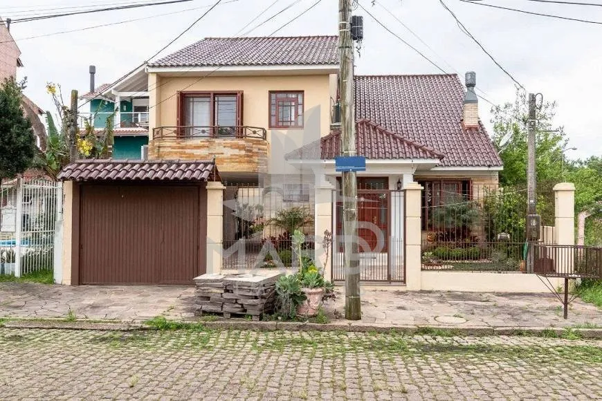 Foto 1 de Casa com 3 Quartos à venda, 293m² em Ipanema, Porto Alegre