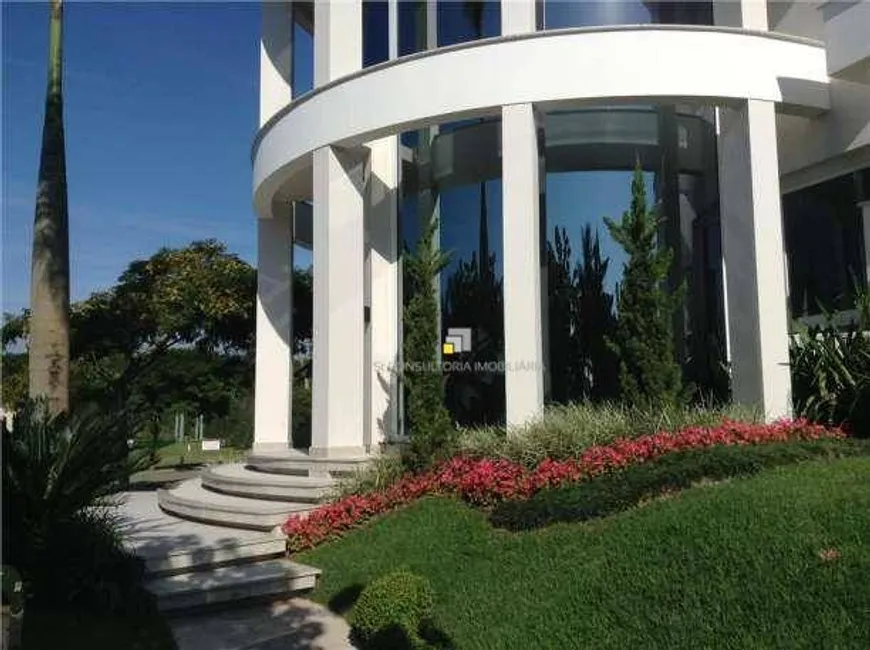 Foto 1 de Casa com 4 Quartos para venda ou aluguel, 535m² em Jurerê Internacional, Florianópolis