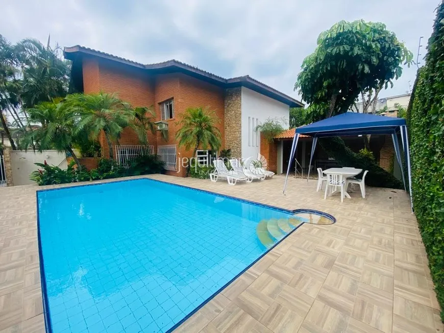 Foto 1 de Casa com 4 Quartos à venda, 336m² em Enseada, Guarujá
