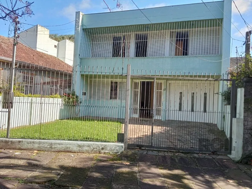 Foto 1 de Casa com 4 Quartos à venda, 331m² em Santo Antônio, Porto Alegre