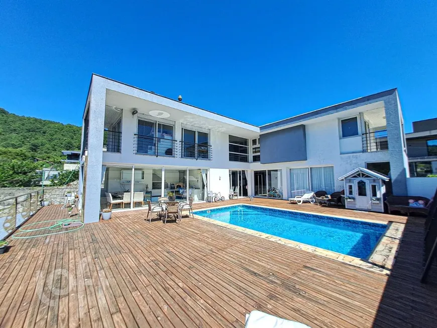 Foto 1 de Casa de Condomínio com 4 Quartos à venda, 344m² em Itacorubi, Florianópolis