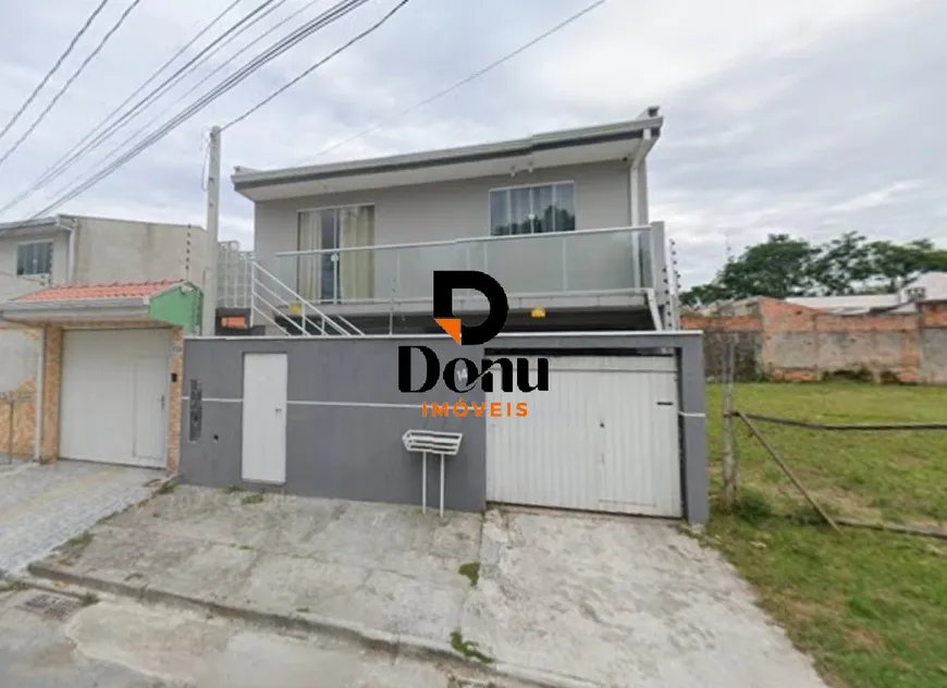 Foto 1 de Sobrado com 7 Quartos para venda ou aluguel, 200m² em Uberaba, Curitiba