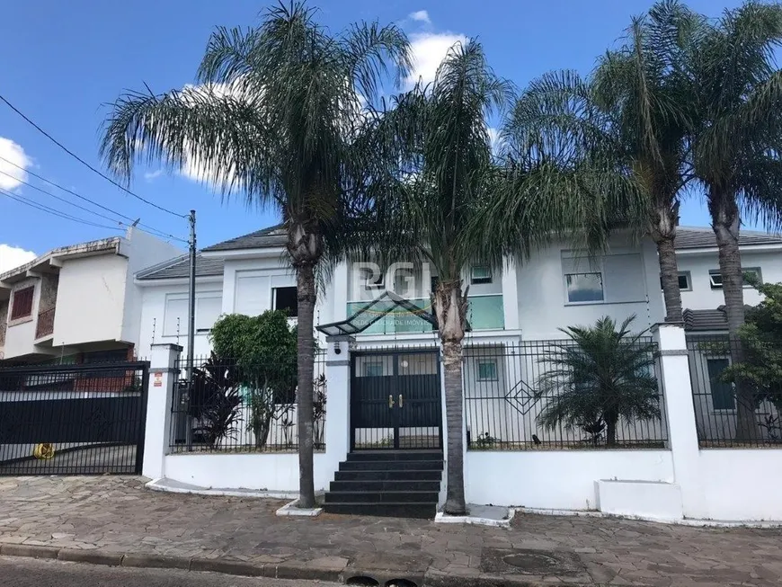 Foto 1 de Casa com 6 Quartos à venda, 494m² em Jardim Floresta, Porto Alegre