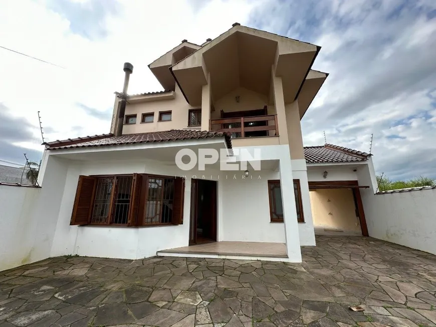 Foto 1 de Sobrado com 4 Quartos à venda, 220m² em Niterói, Canoas