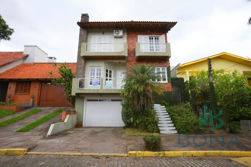 Foto 1 de Casa de Condomínio com 4 Quartos à venda, 300m² em Espiríto Santo, Porto Alegre