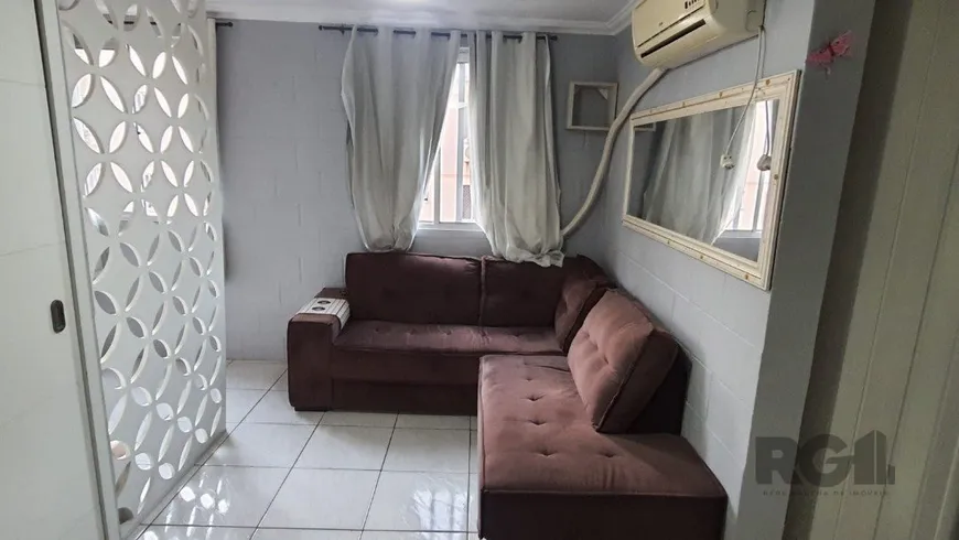 Foto 1 de Apartamento com 2 Quartos à venda, 37m² em Vila Nova, Porto Alegre