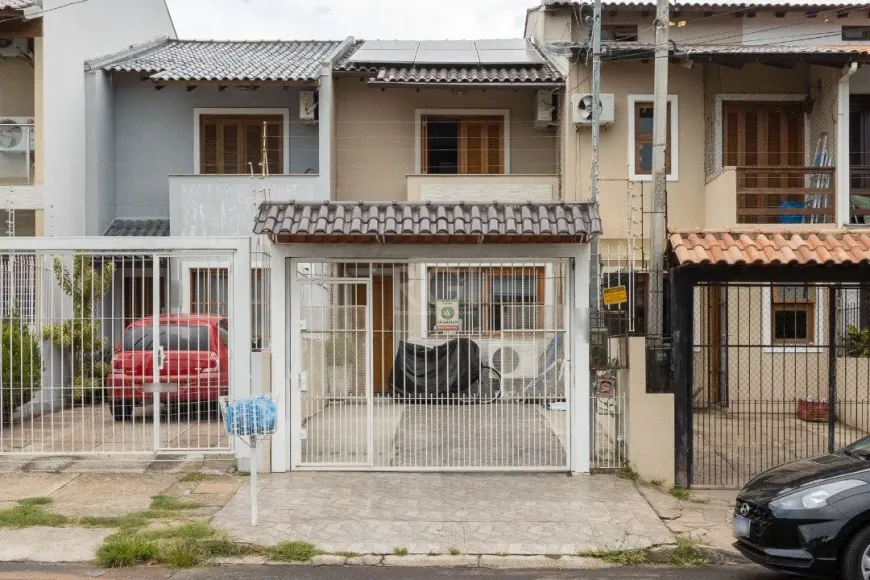 Foto 1 de Casa com 2 Quartos à venda, 93m² em Guarujá, Porto Alegre