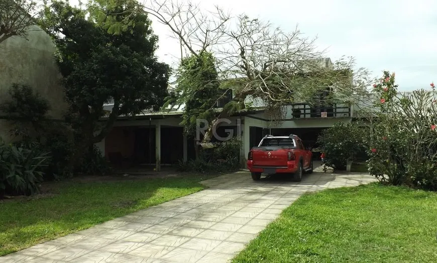 Foto 1 de Casa com 4 Quartos à venda, 200m² em Barra, Tramandaí
