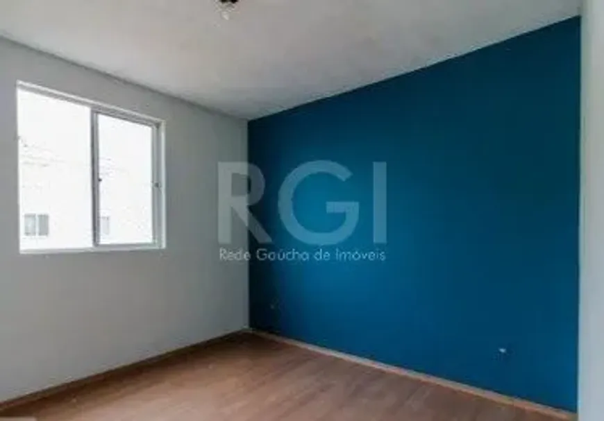 Foto 1 de Apartamento com 2 Quartos à venda, 45m² em Vila Nova, Porto Alegre