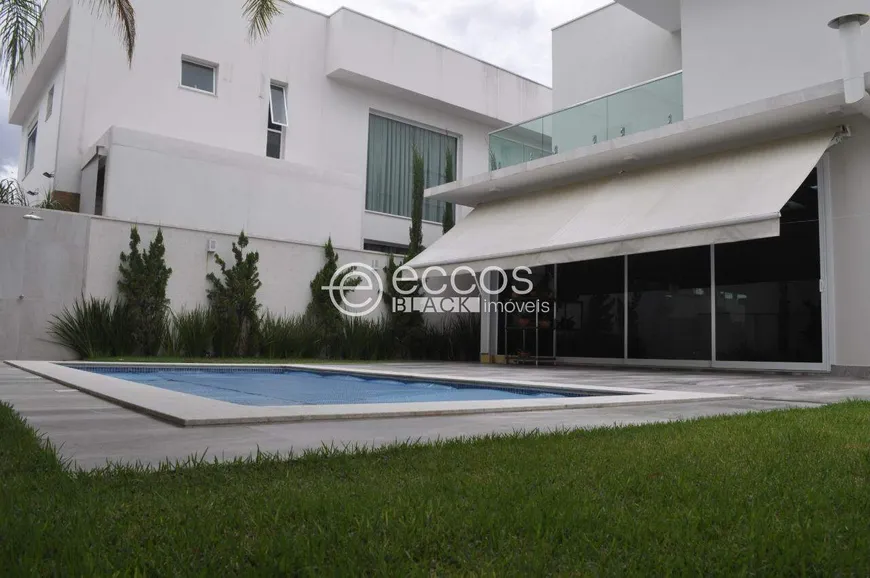 Foto 1 de Casa de Condomínio com 4 Quartos à venda, 300m² em Gávea Sul, Uberlândia