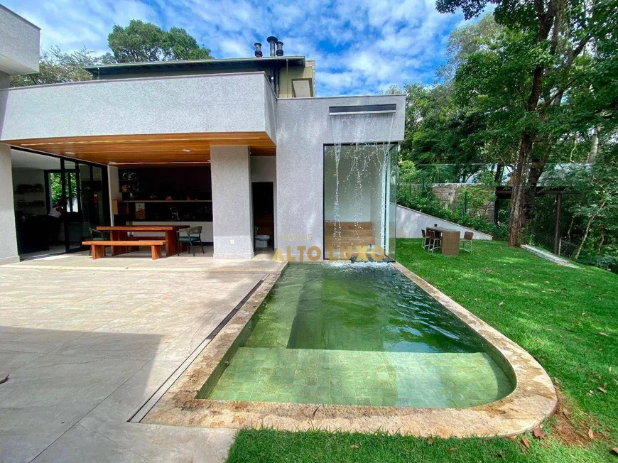 Foto 1 de Casa de Condomínio com 4 Quartos à venda, 390m² em Condominio Quintas do Sol, Nova Lima
