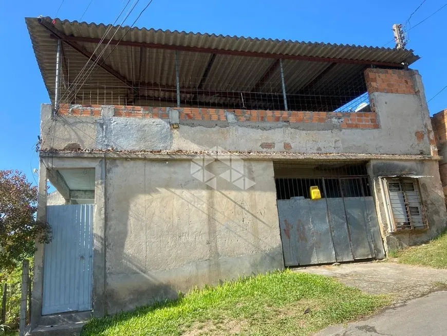 Foto 1 de Casa com 5 Quartos à venda, 140m² em Agronomia, Porto Alegre