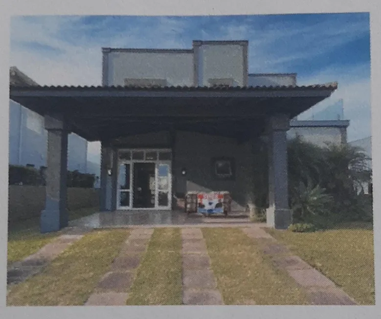 Foto 1 de Casa de Condomínio com 4 Quartos à venda, 450m² em Atlantida Sul, Osório
