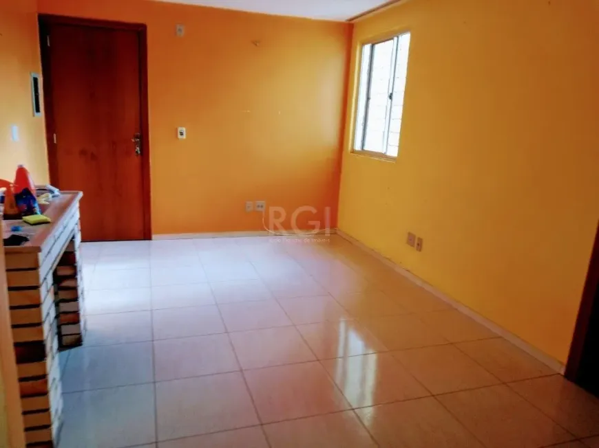 Foto 1 de Apartamento com 2 Quartos à venda, 39m² em Vila Nova, Porto Alegre