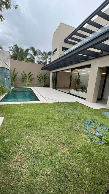 Foto 1 de Casa de Condomínio com 5 Quartos à venda, 483m² em Parque Residencial Tropical Ville , Cuiabá