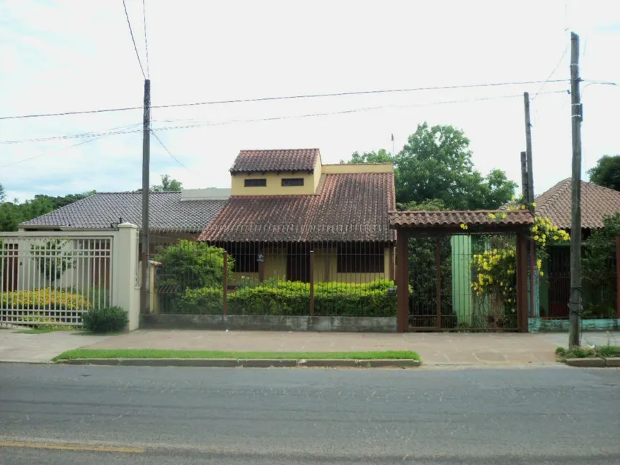 Foto 1 de Casa com 3 Quartos à venda, 189m² em Vila Nova, Porto Alegre